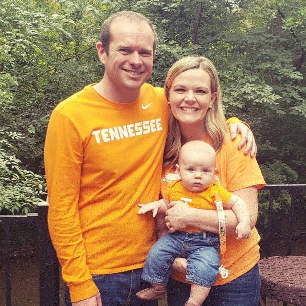 Jeremy Durham with his wife Jessica and their son, all in Tennessee Vols shirts
